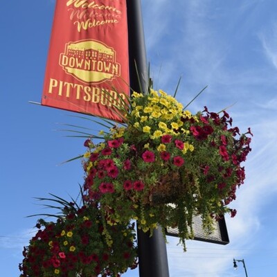 Pittsburg Beautiful pays for the hanging baskets, and the City of Pittsburg hangs and waters throughout May through October.