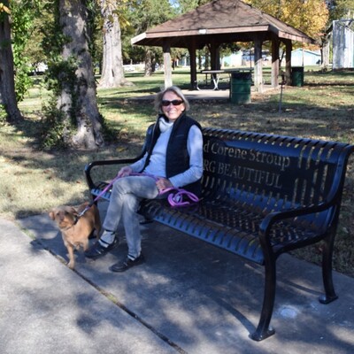 Founding member, Corene Stroup, and Penny at the Lakeside bench dedicated to Corene and her deceased husband, Louis Stroup